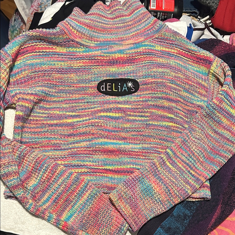 dELiA*s Vibrant Rainbow Turtleneck Sweater